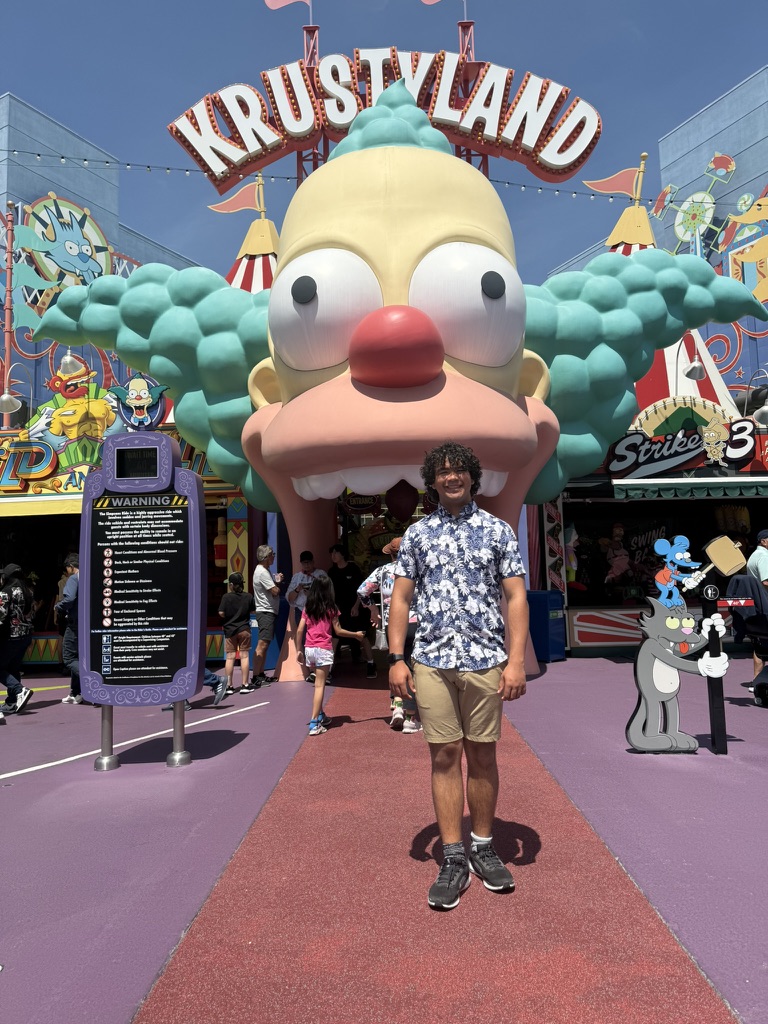 Konnor in front of the Krustyland entrance